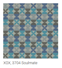 A square fabric swatch with a repeating geometric pattern in blue, teal, gray, and white, labeled 'XOX, 3704 Soulmate' underneath.