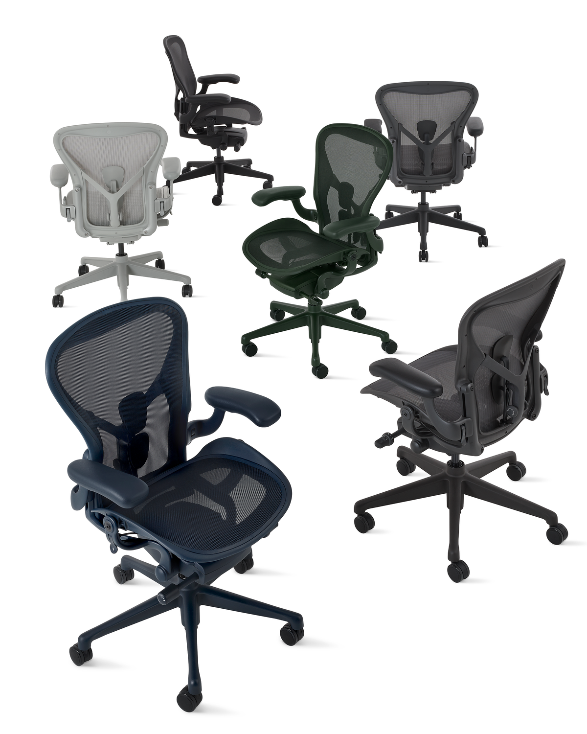 Herman Miller Aeron ergonomic office chairs in different colors laying together