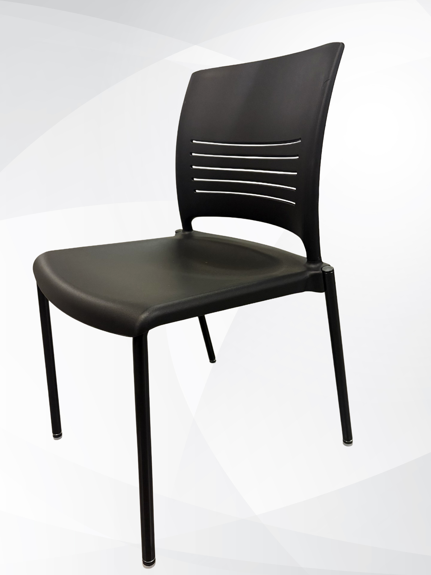 A modern black plastic dining chair with a slatted backrest and four legs, shown against a light gray and white abstract background.