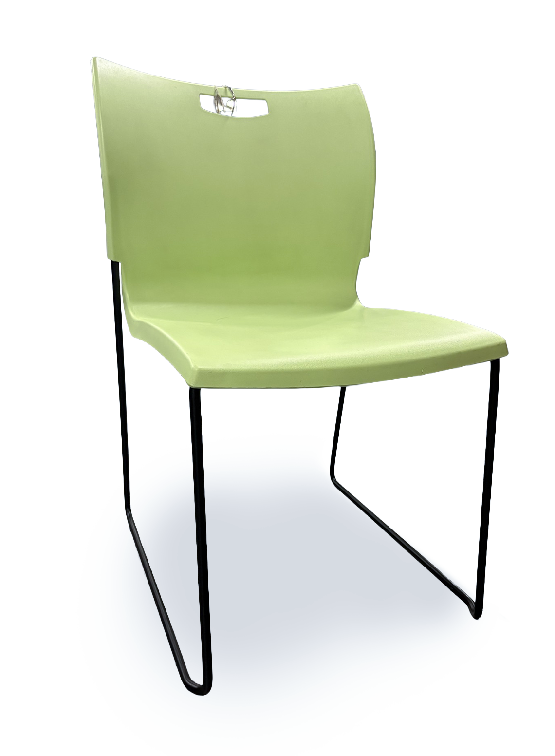 A light green molded plastic chair with a black metal sled base, shown from a three-quarter angle on a white background.