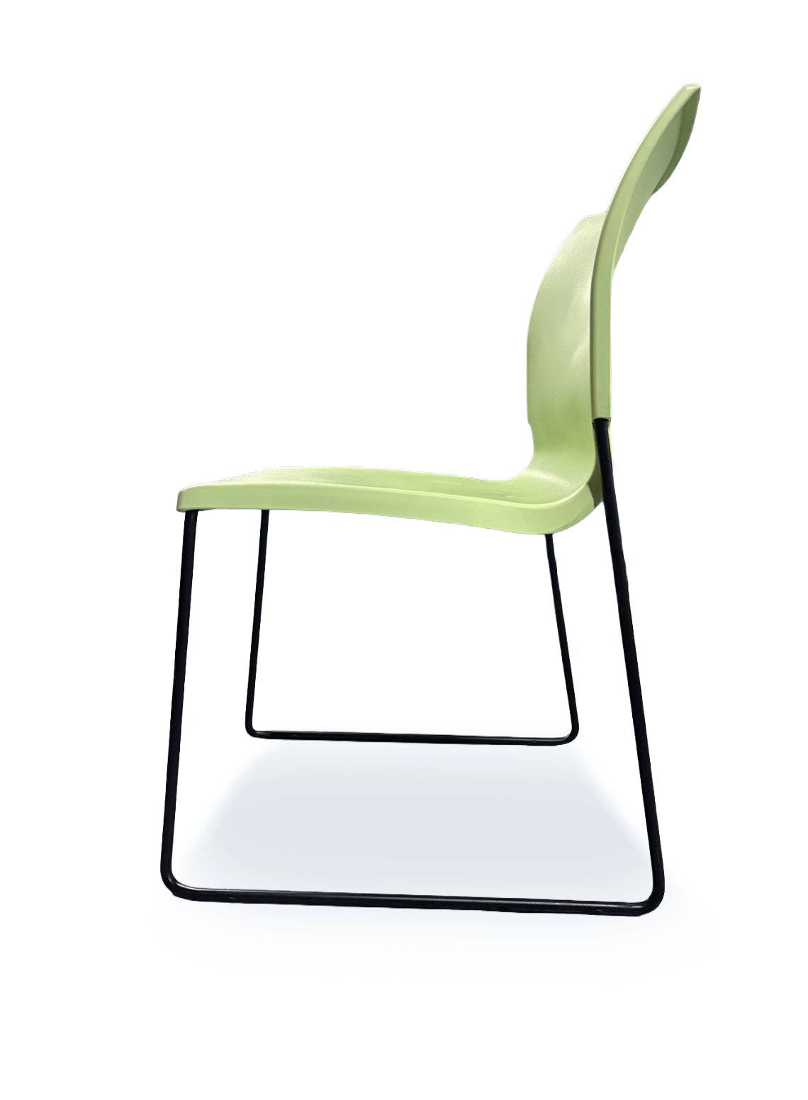 A light green molded plastic chair with a black metal sled base, shown from a side view angle on a white background.
