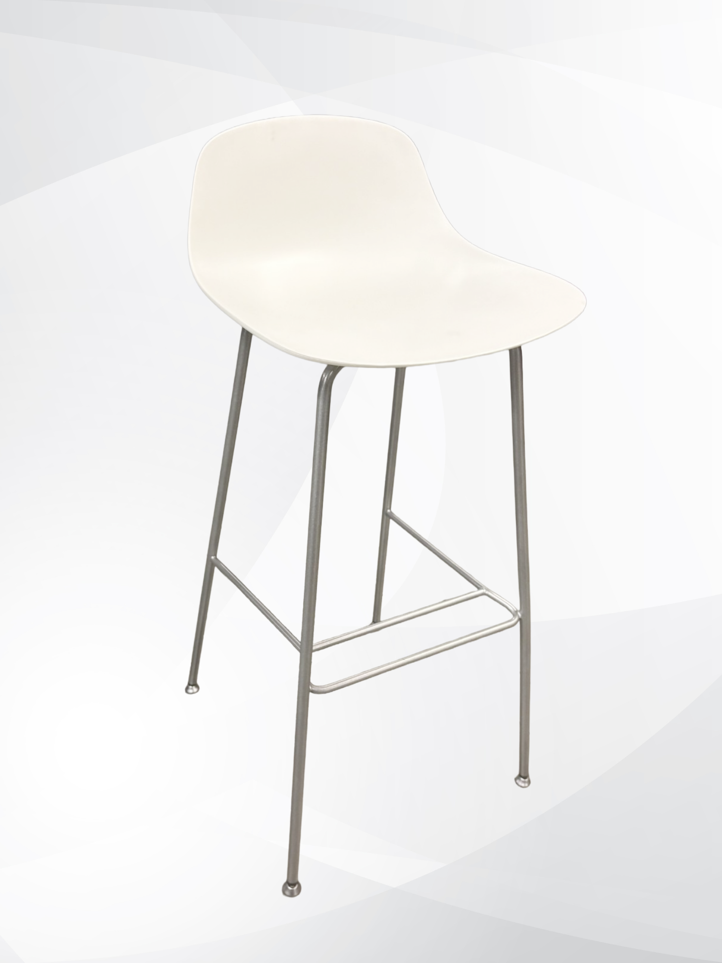 A modern bar stool with a molded white plastic seat and a slim silver metal frame with four legs and a footrest, shown against a light gray and white abstract background.