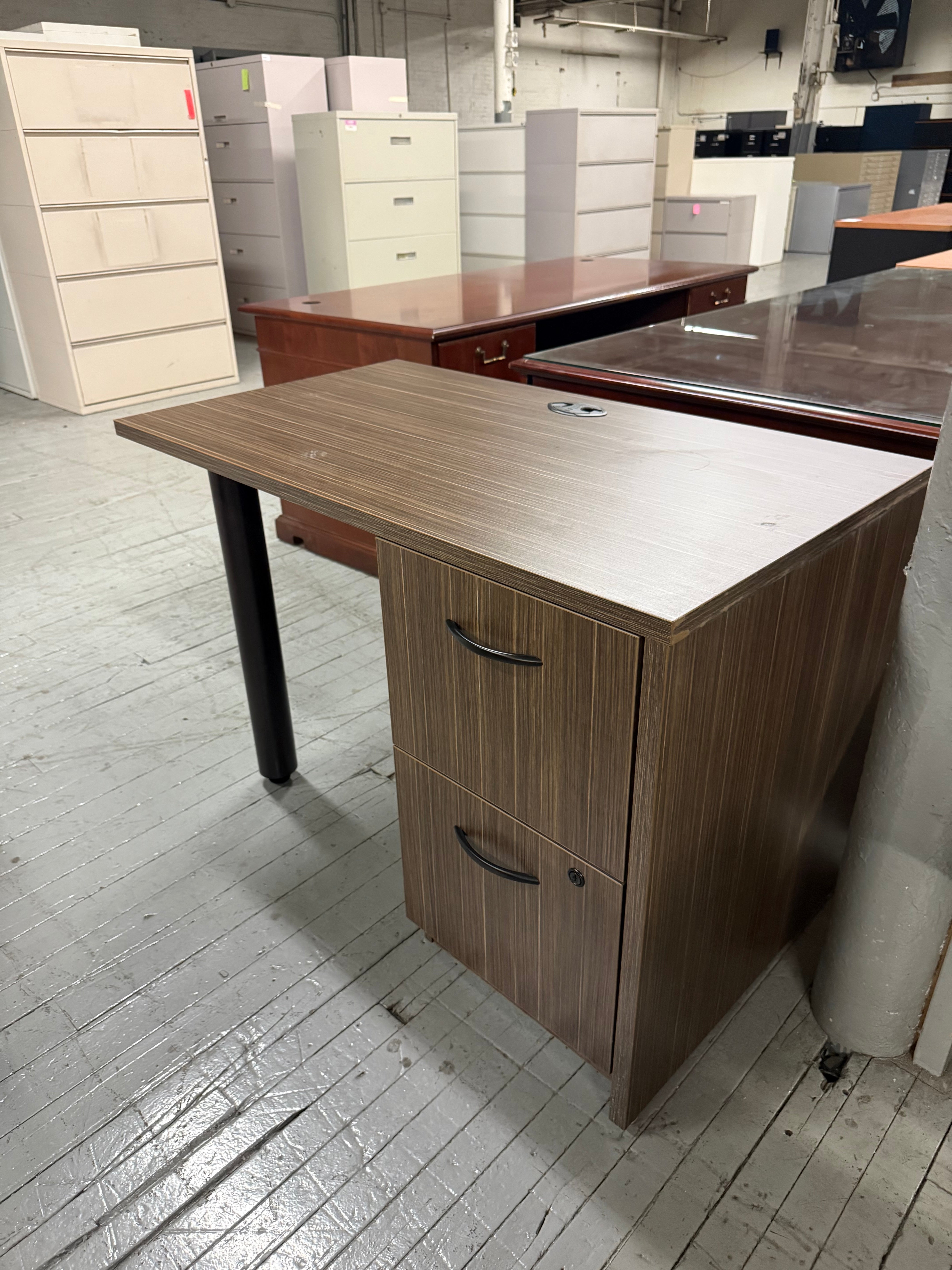 small desk with file cabinet