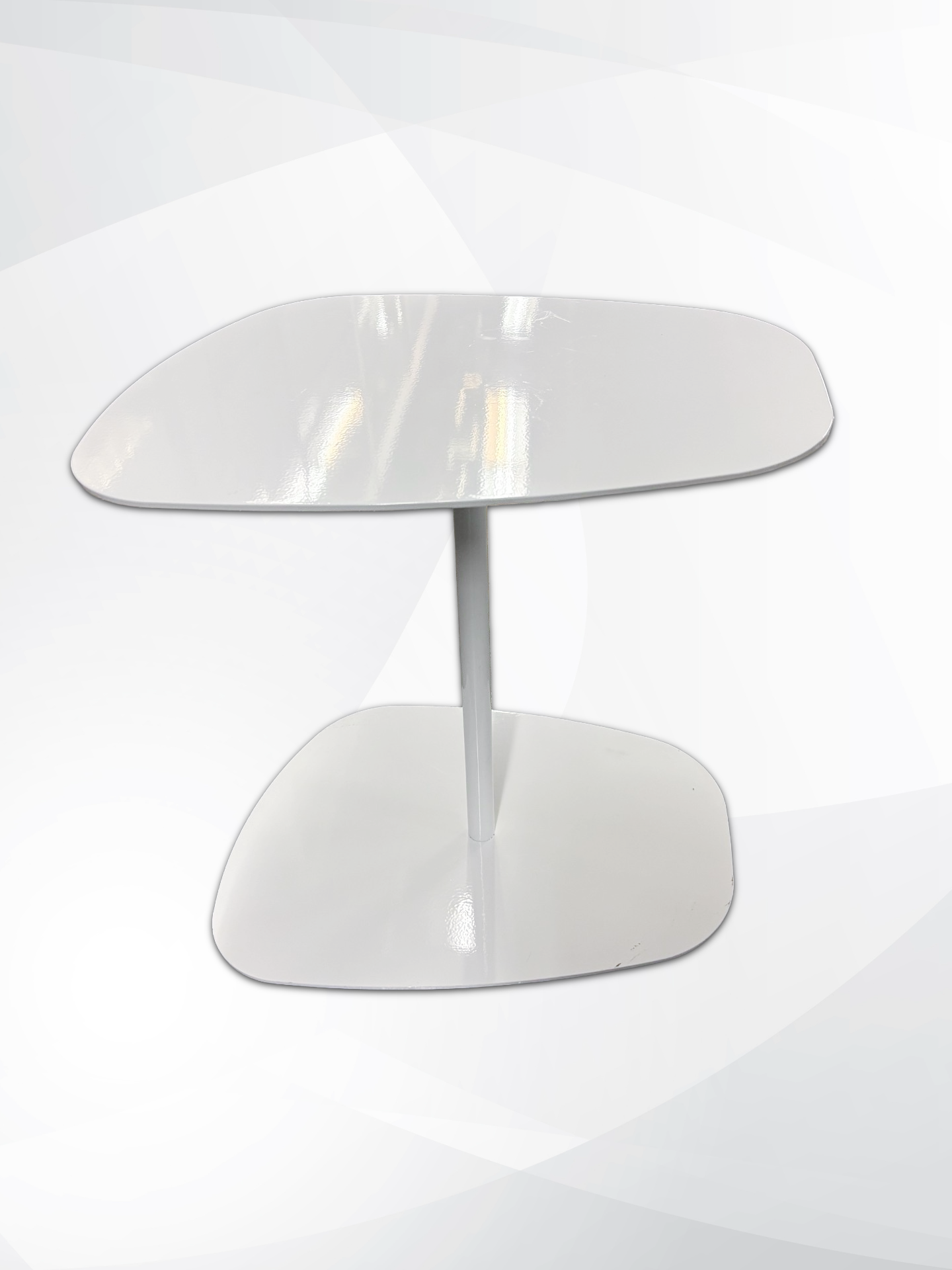 A modern white side table with a glossy, rounded rectangular top and a single central pedestal base, shown against a light gray and white abstract background.