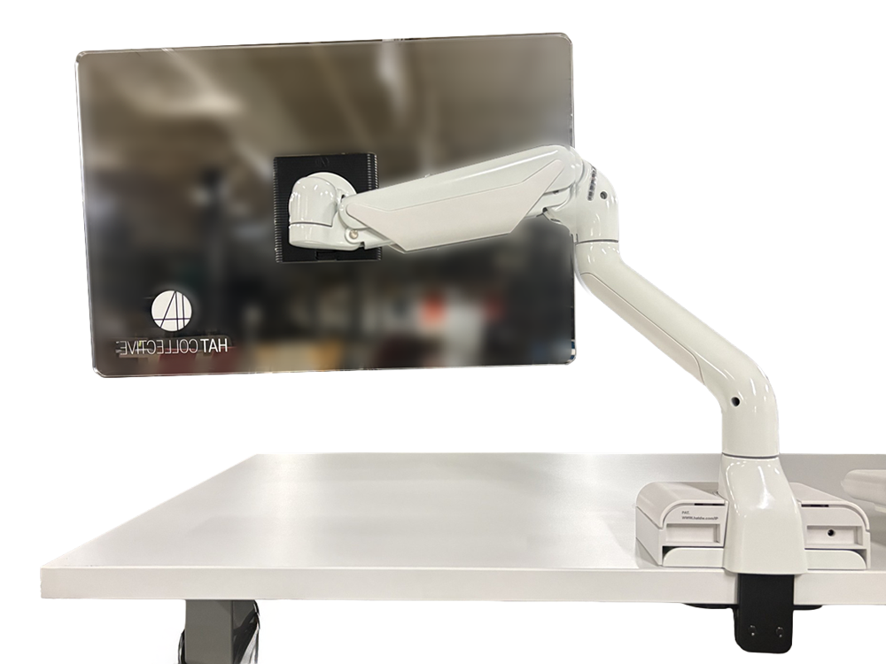 back view of Monitor arm standing on desk 