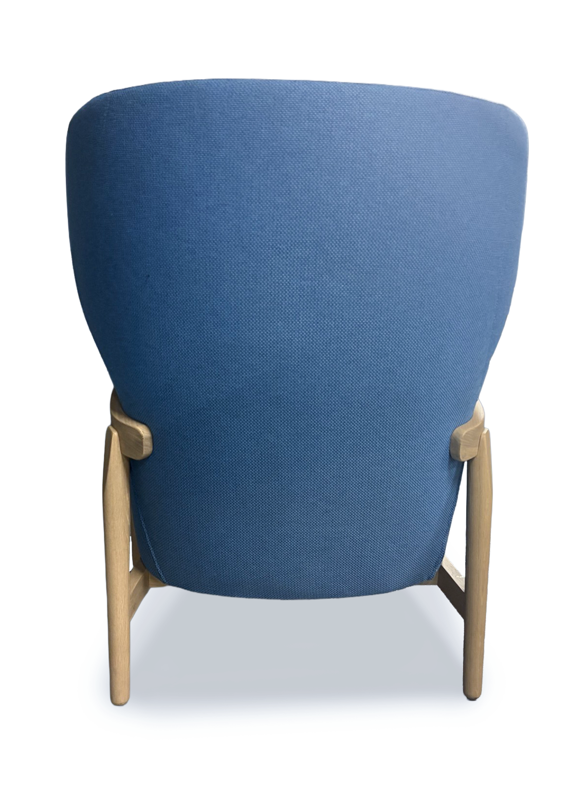 A modern accent chair with a high, rounded back upholstered in textured blue fabric, supported by light natural wood legs and armrests, shown from a rear three-quarter angle on a white background.