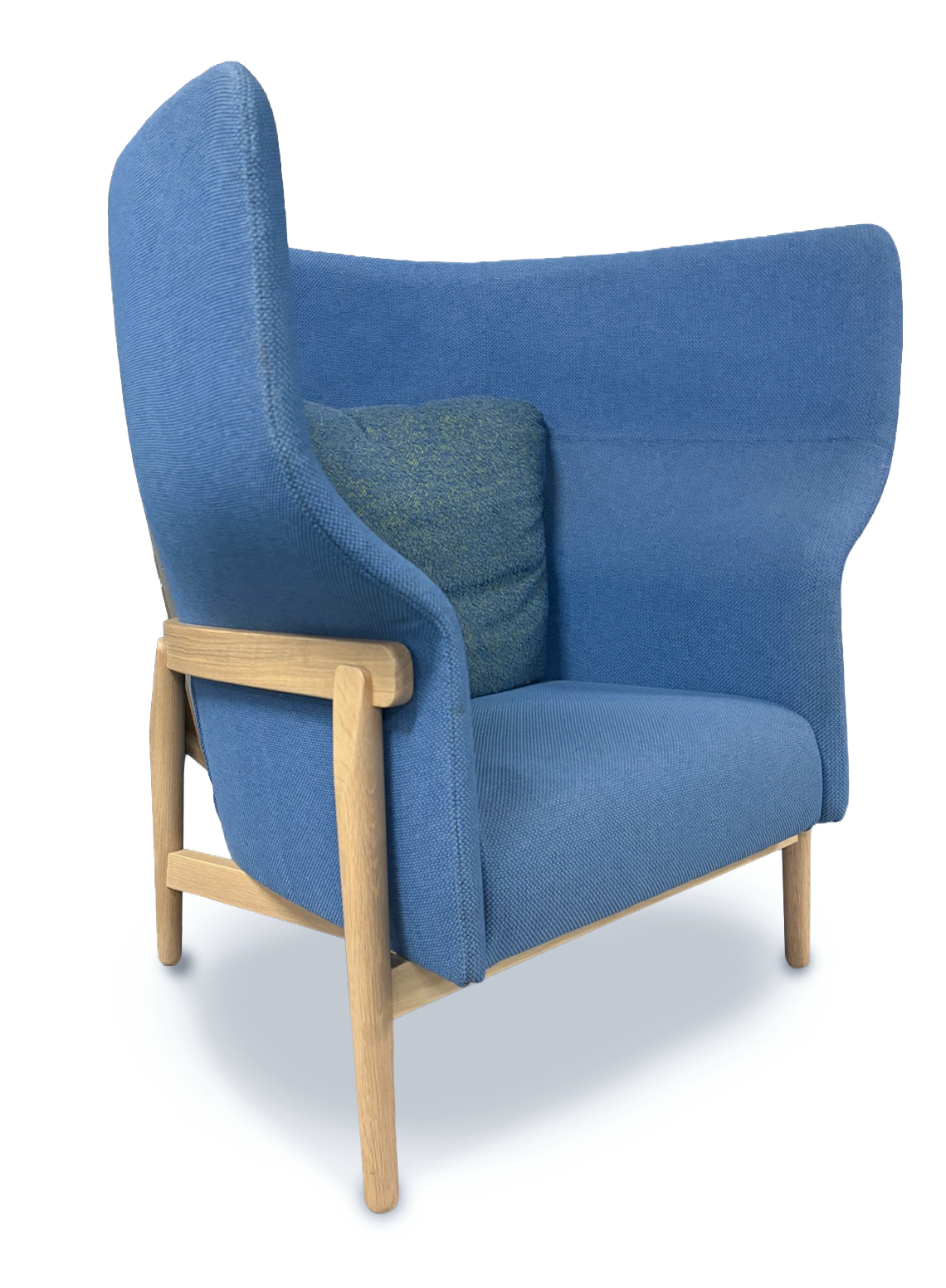A blue upholstered armchair with a tall wingback backrest, light natural wood frame, and a matching blue accent pillow, shown on a white background.