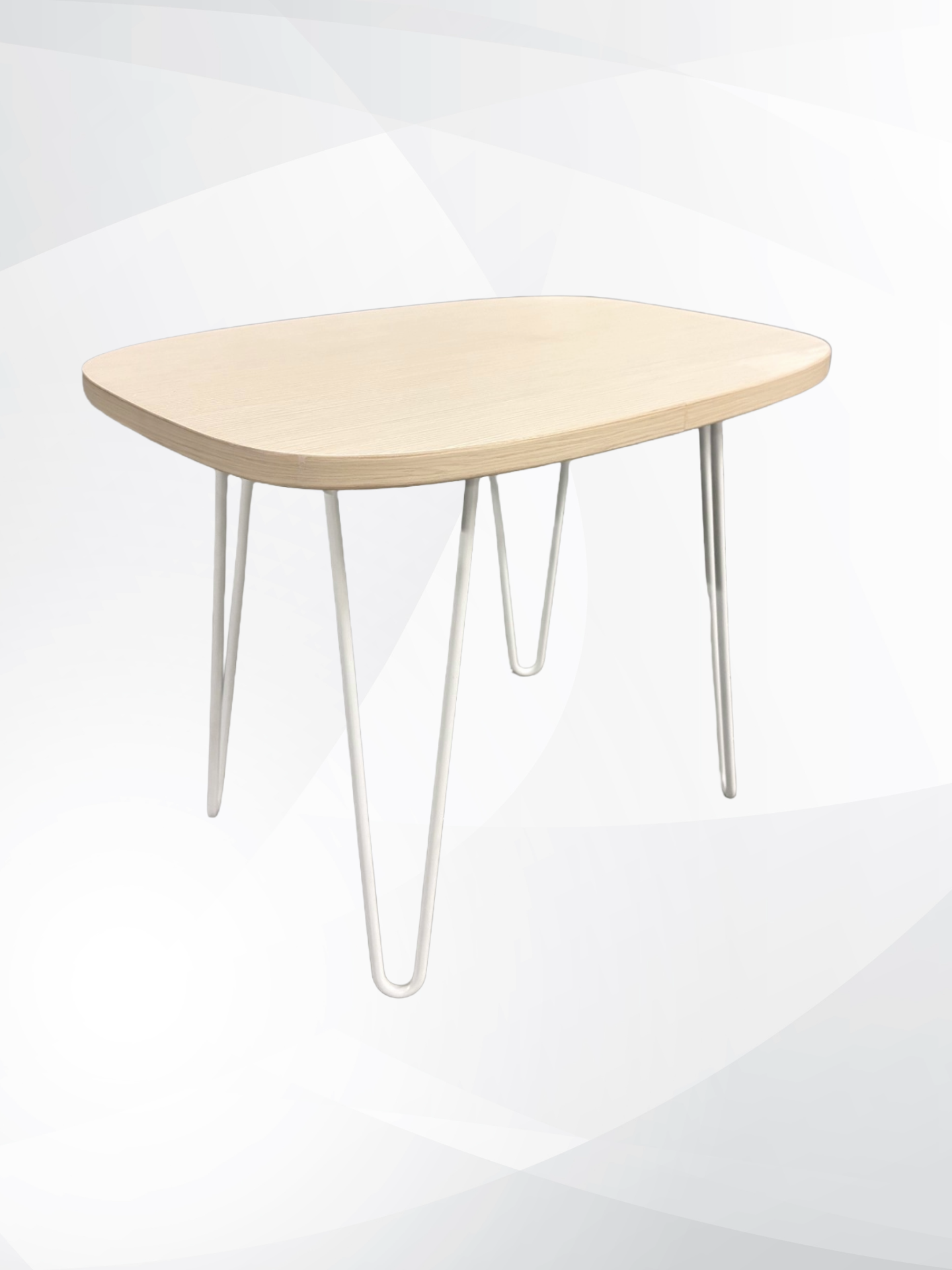A modern rectangular with round corner coffee table with a light natural wood top and slim silver metal hairpin legs, shown against a light gray and white abstract background.