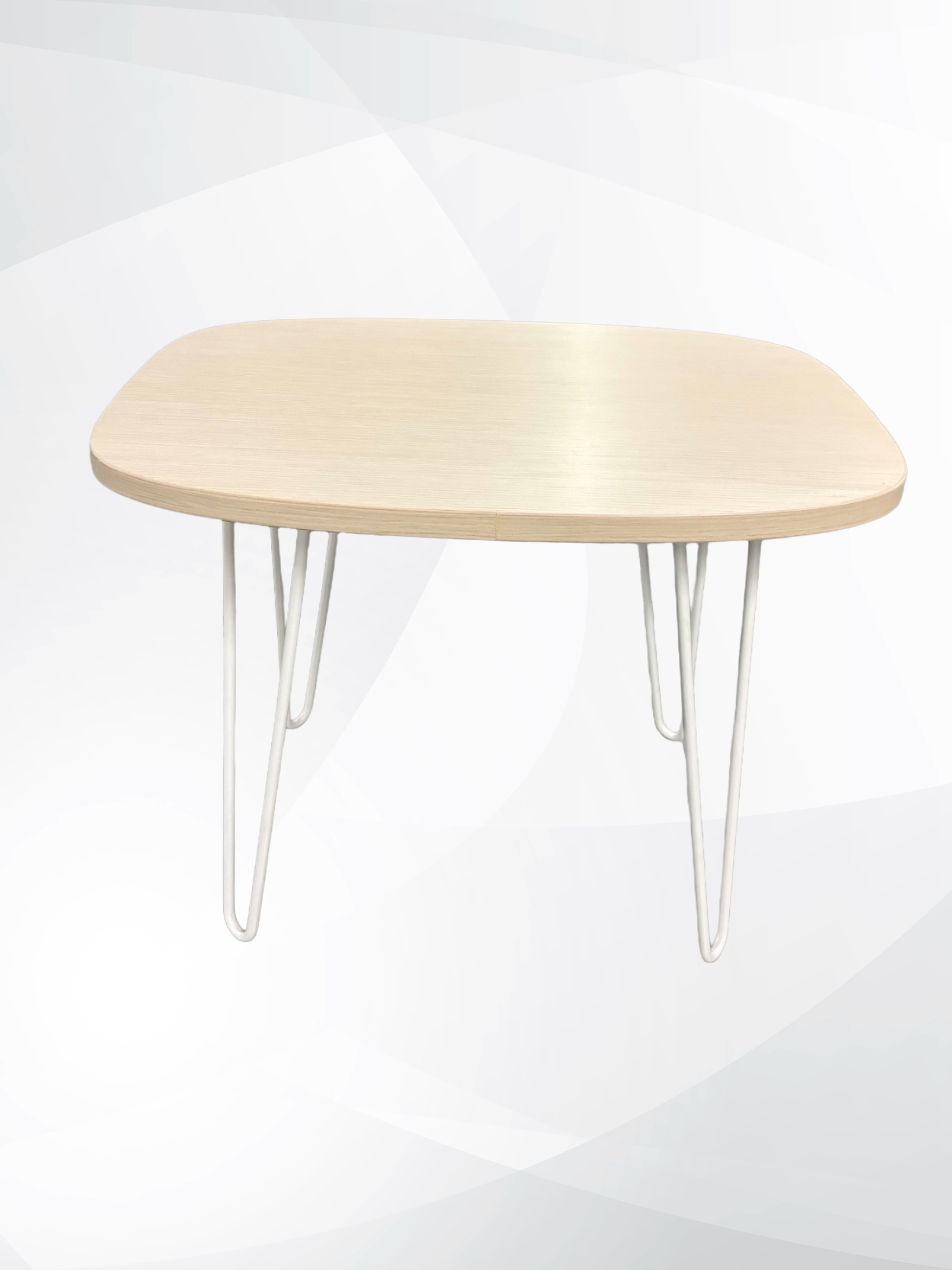 A modern square side table with a light beige wood grain top and slim silver metal hairpin legs, shown against a light gray and white abstract background.
