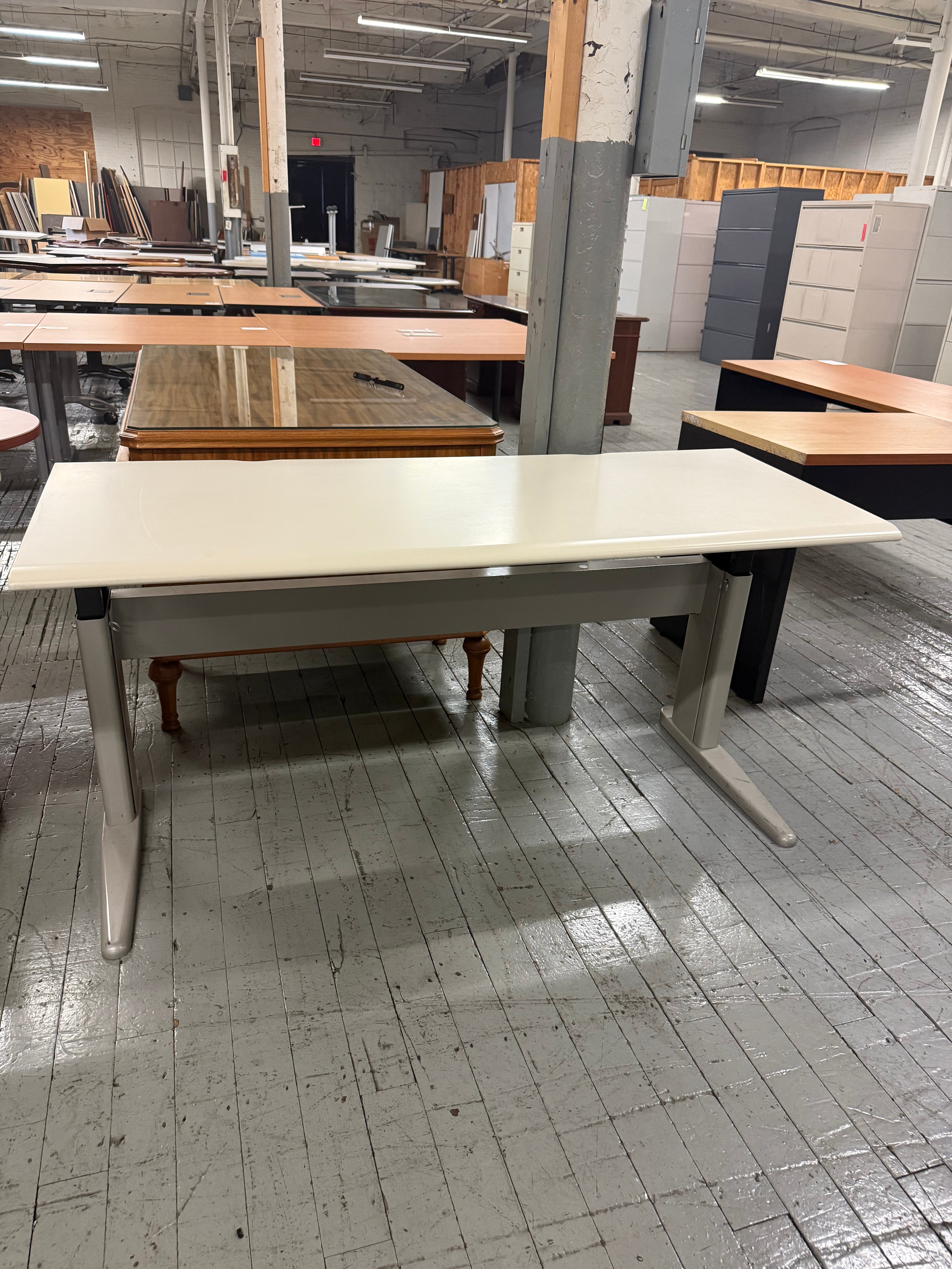 Pre-owned Herman Miller manual height adjustable table with ergonomic sit-stand functionality