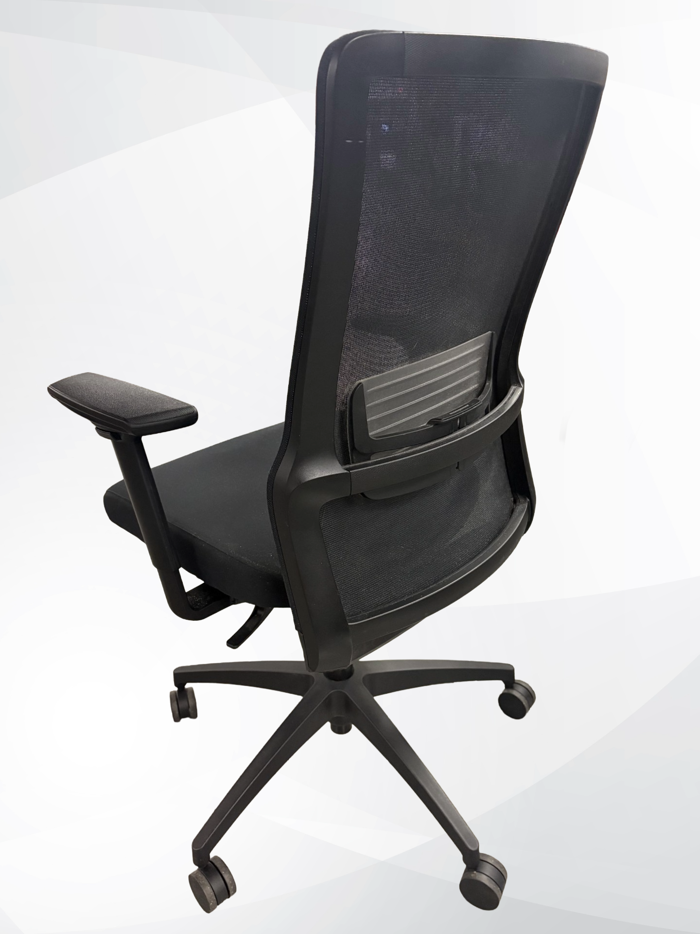 A black mesh office chair with a high back, padded armrests, and a five-wheel base, shown against a light gray background.