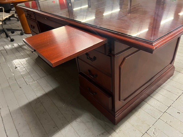 traditional desk featuring a pull-out secret writing pad