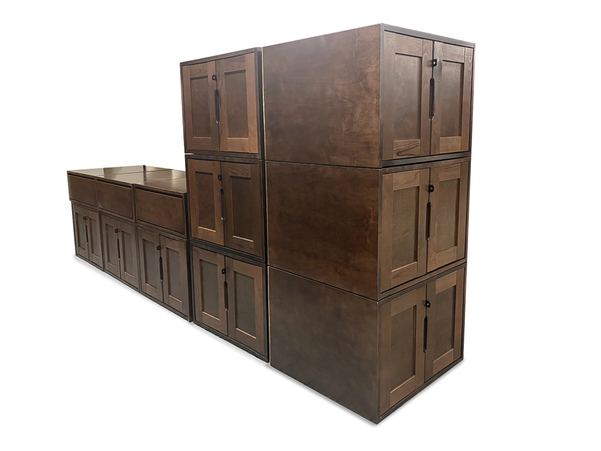 A modular dark brown wooden storage cabinet system with multiple doors and drawers, shown on a plain white background.